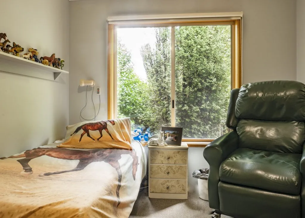 A comfortable, fully-furnished private bedroom at Gracevale Lodge